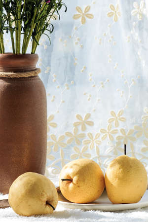 Fresh Pear on white fur clothの写真素材