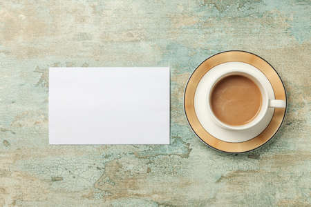 Coffee and paper on the tableの写真素材