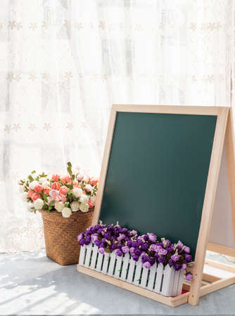 Blackboard by the window sillの写真素材