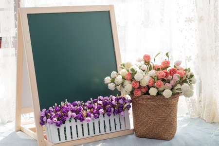 Blackboard by the window sillの写真素材