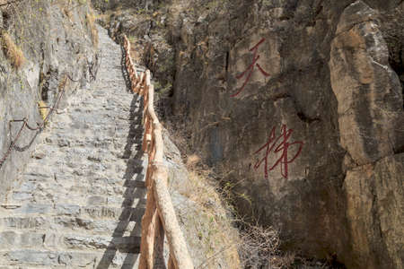 Steep stone ladder in the valleyのeditorial素材