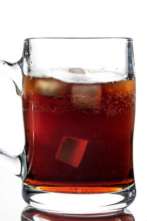 Glass of cola with ice cubes