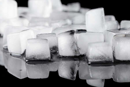 Ice cubes on black backgroundの写真素材