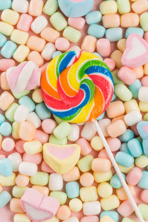 Colorful candies, lollipop and heart-shaped marshmallowsの写真素材
