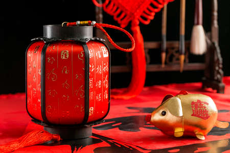 Chinese New Year materials such as couplets, lanterns, chinese brush pens and rat soft toyの写真素材