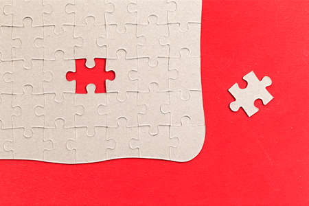 Puzzle pieces on red background