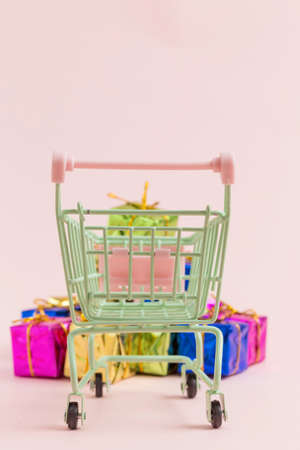 Shopping cart and fancy gift boxesの写真素材
