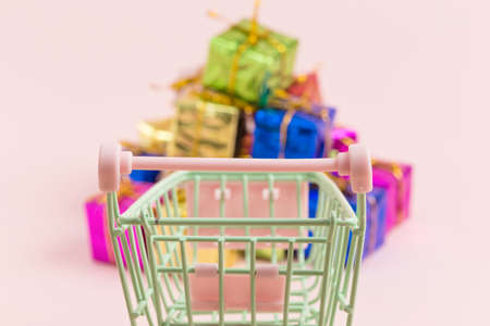 Shopping cart and fancy gift boxesの写真素材