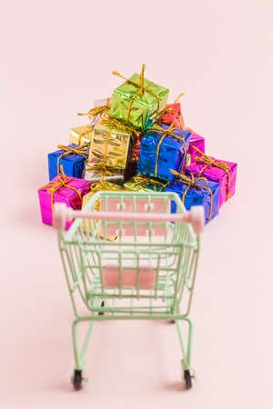 Shopping cart and fancy gift boxesの写真素材
