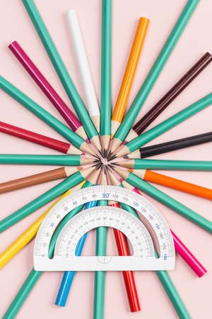 Colorful pencils on the pink backgroundの写真素材