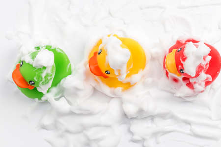 Toy duck taking a bathの写真素材