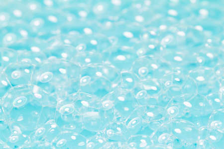 Soap bubbles on blue screenの写真素材