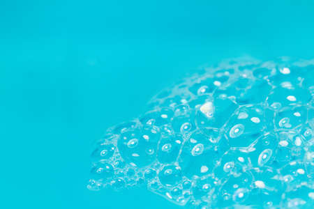 Soap bubbles on blue screen