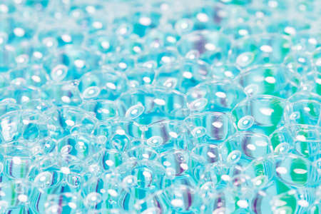 Soap bubbles on multicolor screenの写真素材