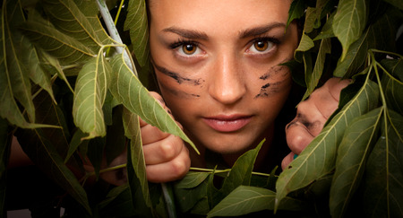 Portrait of a woman in the jungle special forces close-upの写真素材