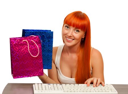 The girl makes shopping in Internetの写真素材