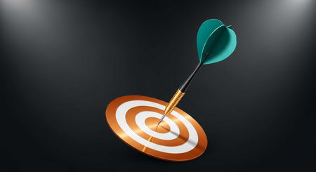 a dart hits the bullseye on a target, symbolizing accuracy, goal achievement, and business success in a competitive environment.の素材