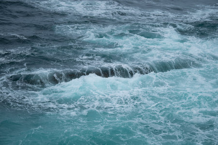 Wave crashing with a coastlineの写真素材