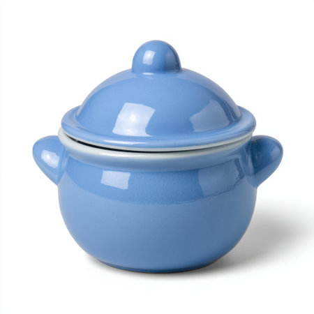 A charming, light blue ceramic pot with two small handles and a matching lid, presented against a clean white background.の素材