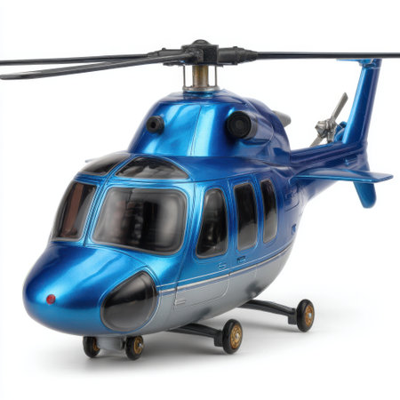 A detailed close-up of a shiny blue toy helicopter with silver accents, resting on its landing gear against a clean white backdrop.の素材