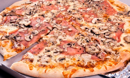 Pizza capricoza in a boxの写真素材