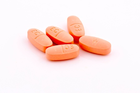 Vitamins pills isolated on the whiteの写真素材