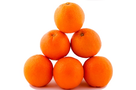 Oranges pyramide isolated on the whiteの写真素材