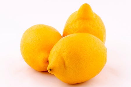Three lemons isolated on the whiteの写真素材