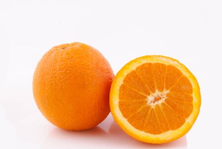 Whole and sliced orange isolatedの写真素材