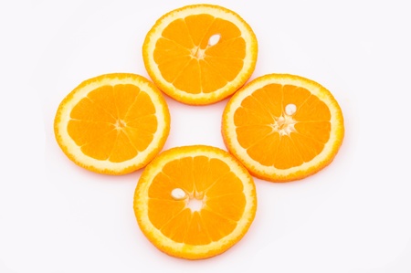 Oranges slices isolated on the whiteの写真素材