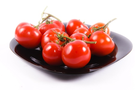 Tomatoe plate isolated on the whiteの写真素材