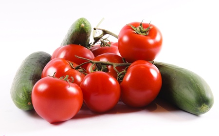 Group of tomatoes isolated on whiteの写真素材