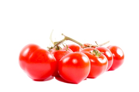 Tomatoes isolated on whiteの写真素材