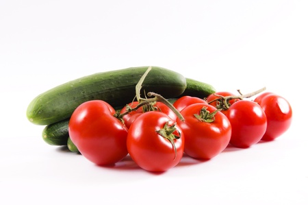 Tomatoes and cucumbersの写真素材