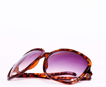 Fancy female sunglasses isolated on white