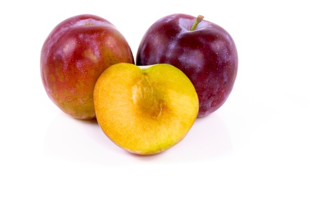 Fresh plum isolated on whiteの写真素材