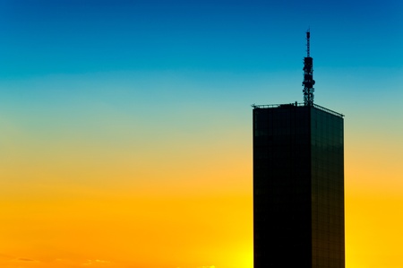 Modern building on the sunsetの写真素材