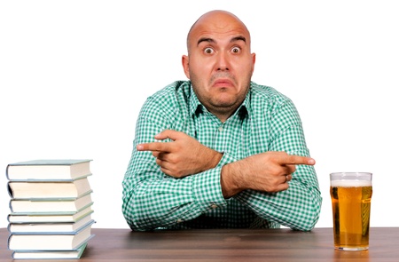 Man choose between books and beerの写真素材
