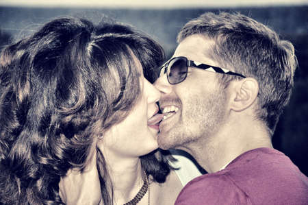 Happy couple in vintage techniqueの写真素材