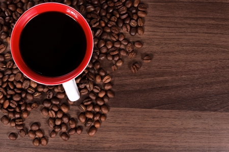 Coffee cup on the wooden backgroundの写真素材