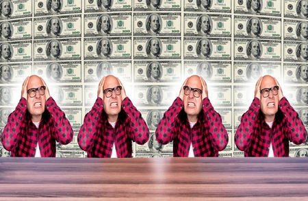 A man under stress due to financial crisisの写真素材