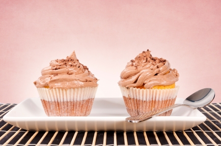 Chocolate cup cakes on the plateの写真素材