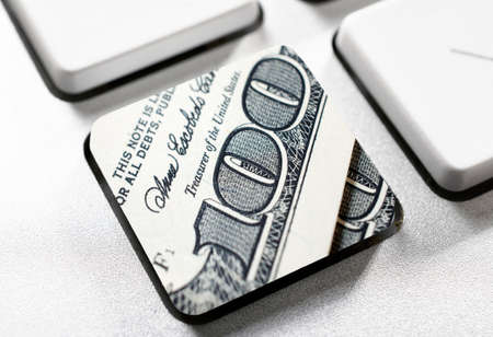 Selective focus on the one hundred dollar buttonの写真素材