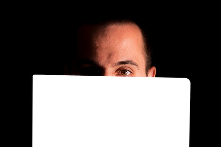 Man with blank space ower his head. Shoot in low key techniqueの写真素材