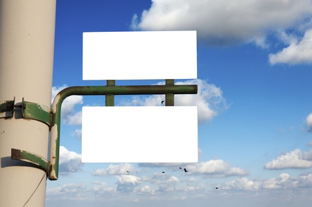 Two blank board ower the blu sky の写真素材