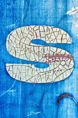 Letter s on the old blue backgroundの写真素材
