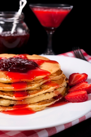 Pancakes with fresh homemade strawberries jamの写真素材