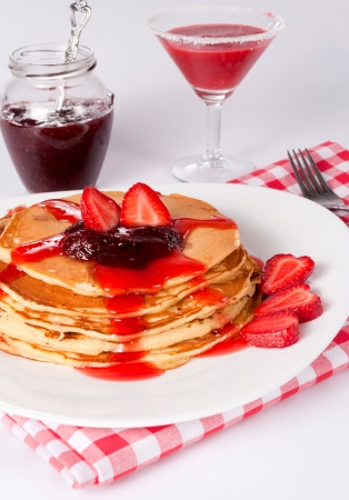 Fresh homemade pancakes with strawberries jamの写真素材