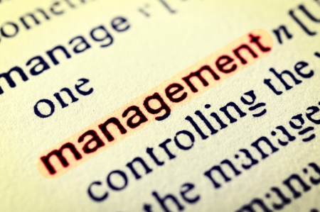 The word Management highlighted in red. Selective focus in the middle of wordの写真素材