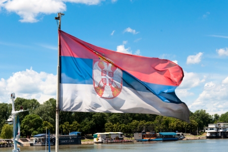 Official Serbian flag  over the sky の写真素材